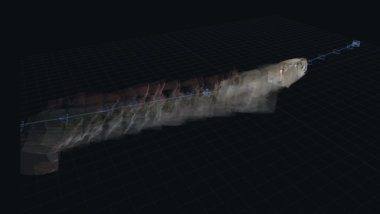 A walk through an alley strung out as a trail of ghostly walls along the measured camera path